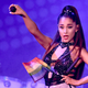 Ariana holding her microphone up to the Jezebel staff because she wants to know what we think